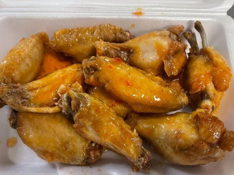 EZ-YUMMY-FOOD-Asian-Restaurant-buffalo-wings-Ahoskie Tasty buffalo - style chicken wings in a foam container, available at EZ YUMMY FOOD, a Asian Restaurant in Ahoskie