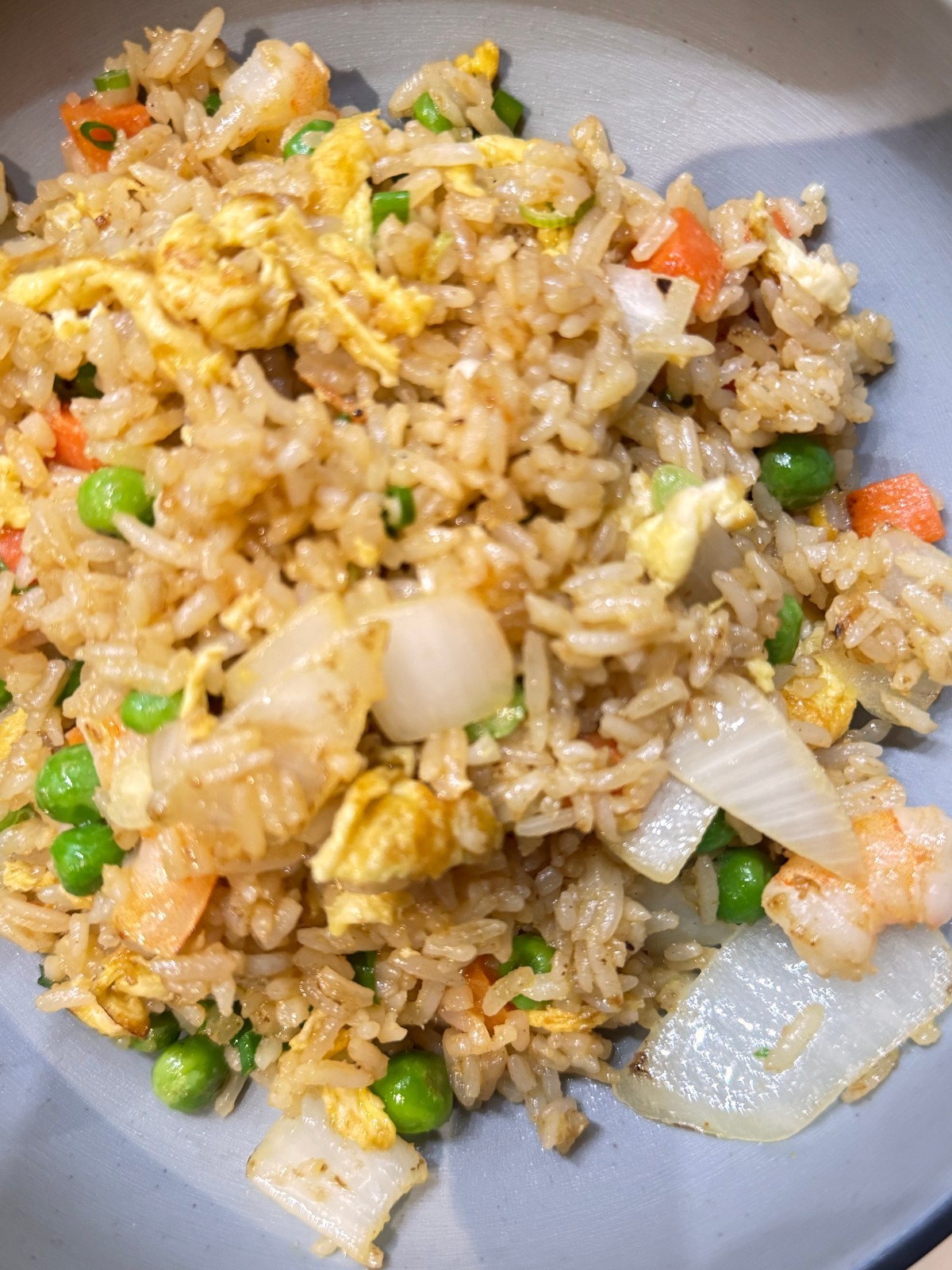 Savory shrimp fried rice with eggs, peas and onions at Takumi, a Japanese Restaurant in Fairview Heights