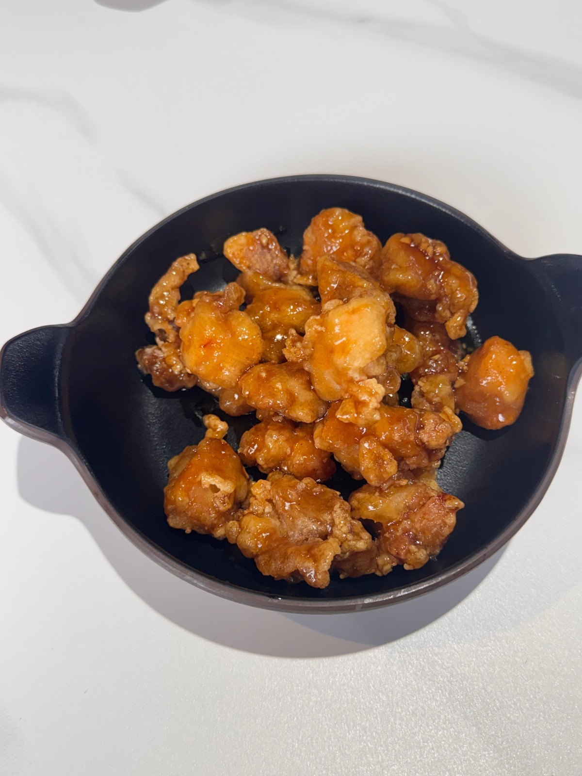 Sweet and crispy orange-flavored fried chicken bites at Takumi, a Japanese Restaurant in Fairview Heights