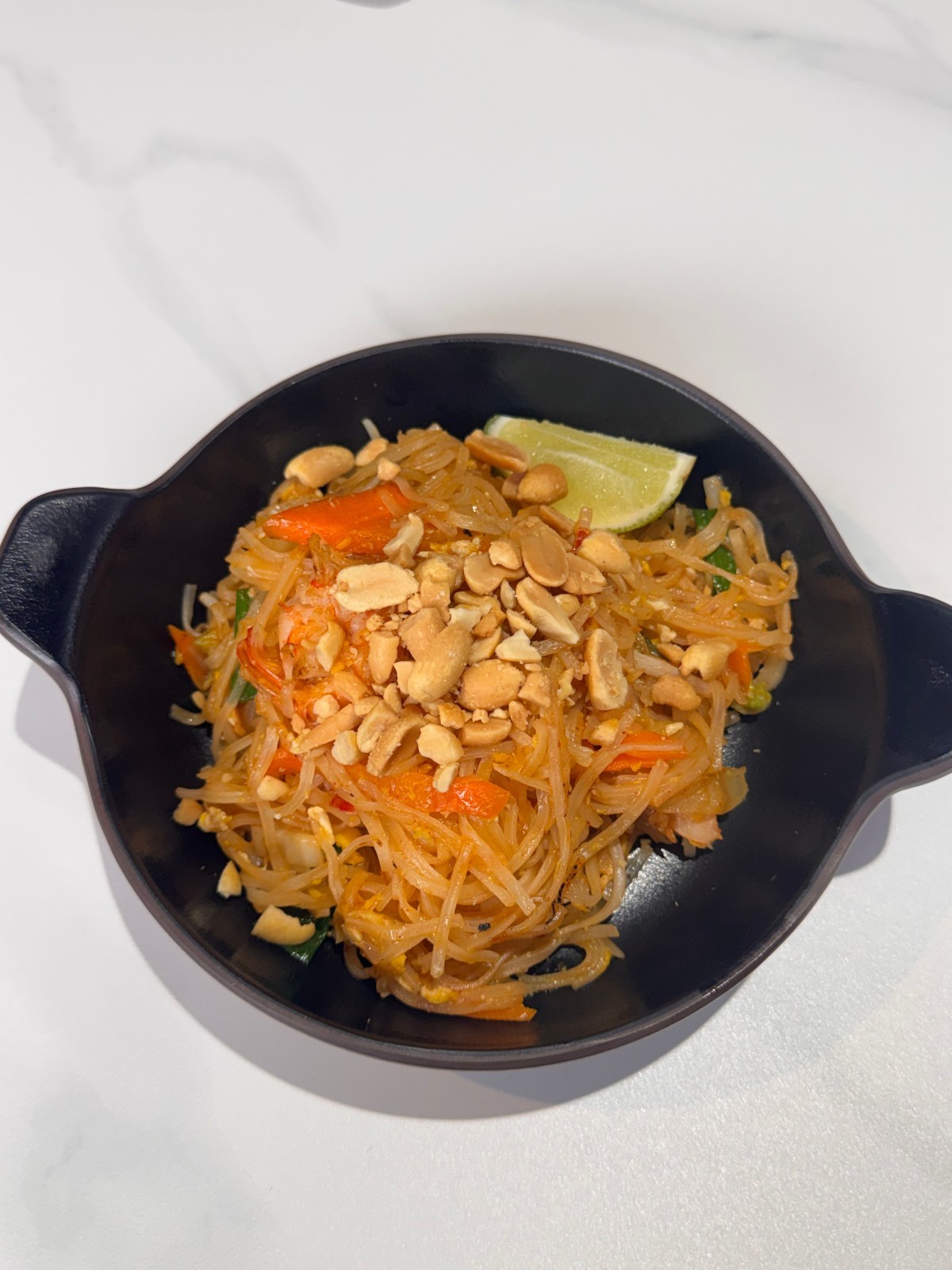 Thai stir-fried rice noodles with shrimp, peanuts, lime at Takumi, a Japanese Restaurant in Fairview Heights