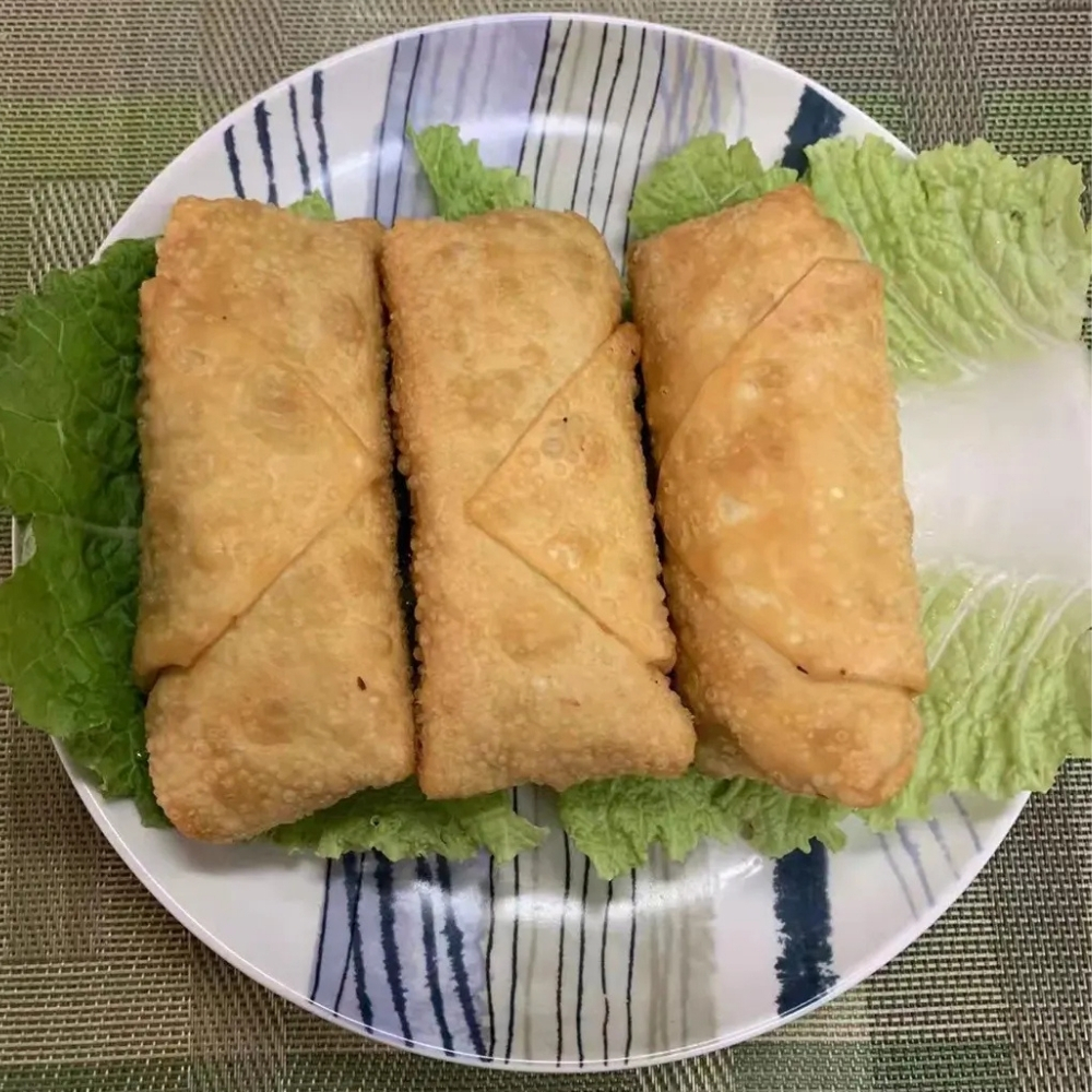 Three fried egg rolls at Family Kitchen, an Chinese Restaurant in Brooklyn.