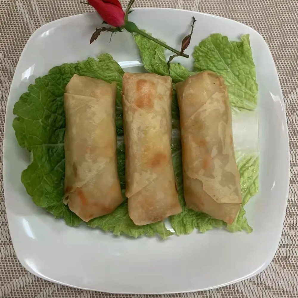 Three vegetable spring rolls at Family Kitchen, an Chinese Restaurant in Brooklyn.