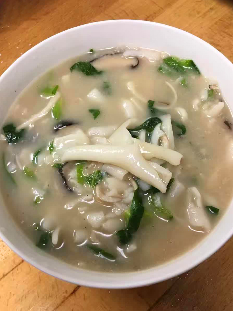 Fuzhou Guobian, a traditional Fuzhou snack, thin and smooth rice paste in soup at Fang's Wok，a Asian Restaurant in Plano