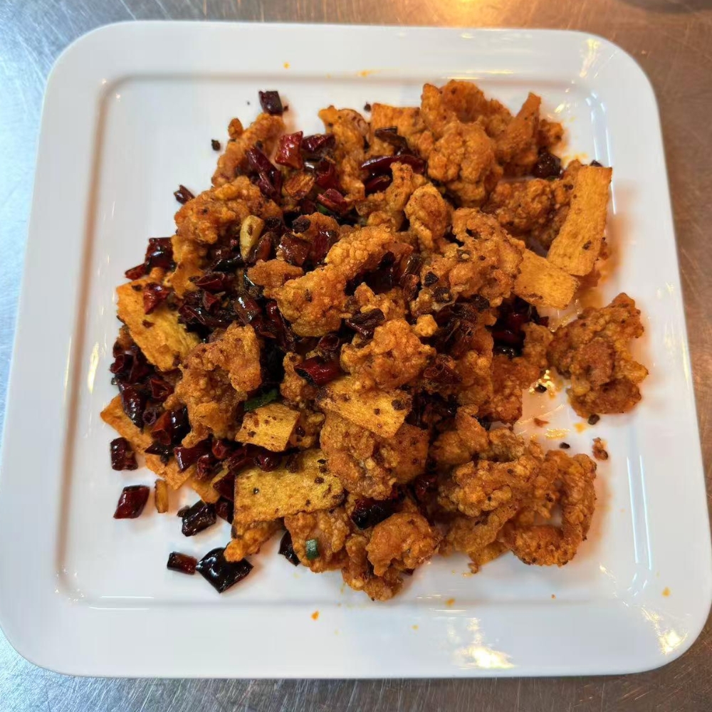 Spicy crispy chicken with dried chili and tofu chips at Farmer kitchen, a Chinese Restaurant in Monterey Park