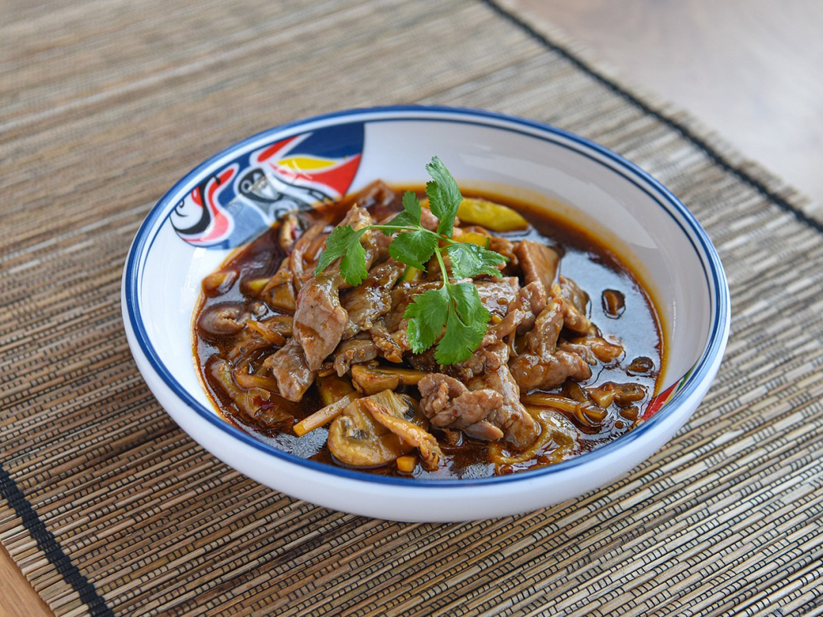 Spicy beef stir-fry with mushrooms at Fat Boy Roasted Delights, a Chinese Restaurant in Modesto
