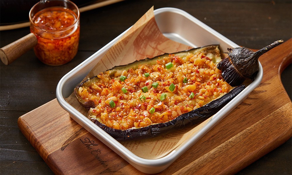 Grilled eggplant topped with garlic and chili at FENGMU, a Korean BBQ Restaurant in Rowland Heights