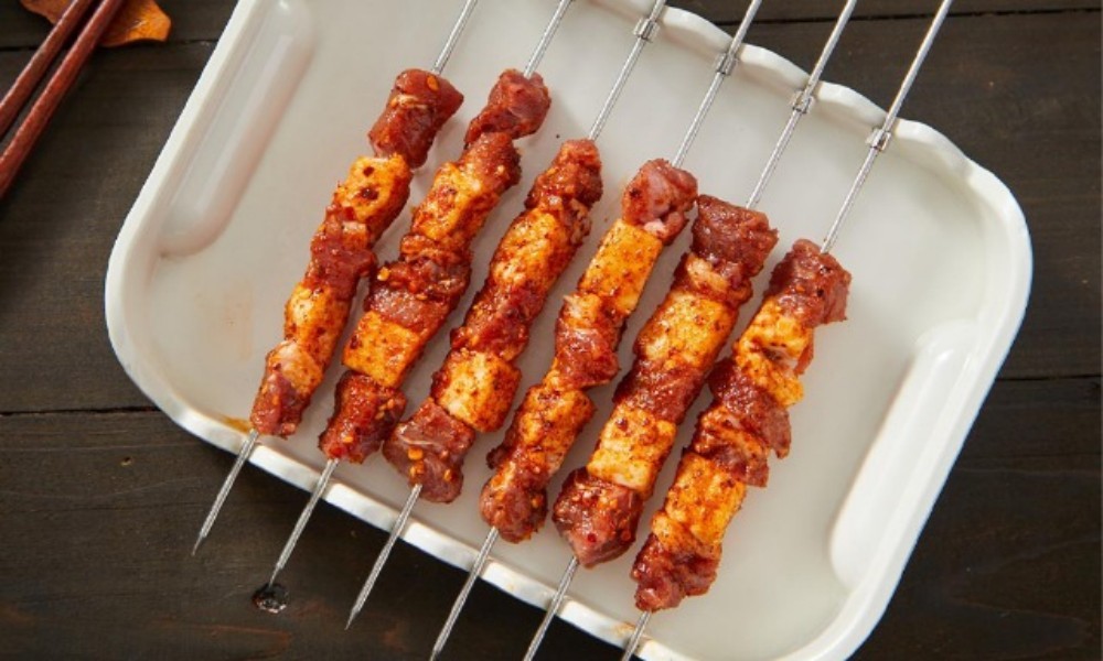 Marinated spicy lamb skewers at FENGMU, a Korean BBQ Restaurant in Rowland Heights