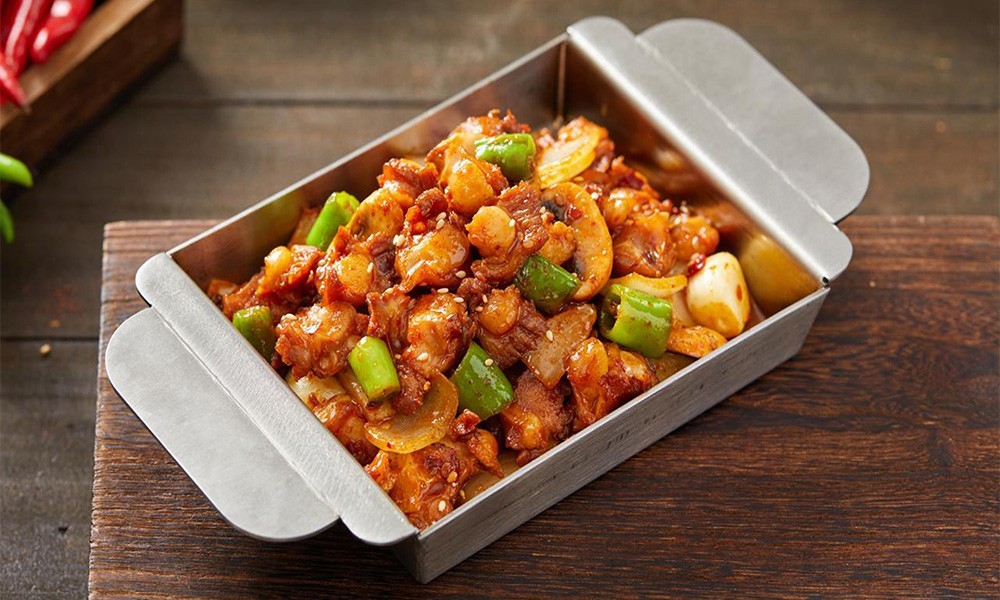 Spicy stir-fried crispy chicken cartilage with green peppers at FENGMU, a Korean BBQ Restaurant in Rowland Heights