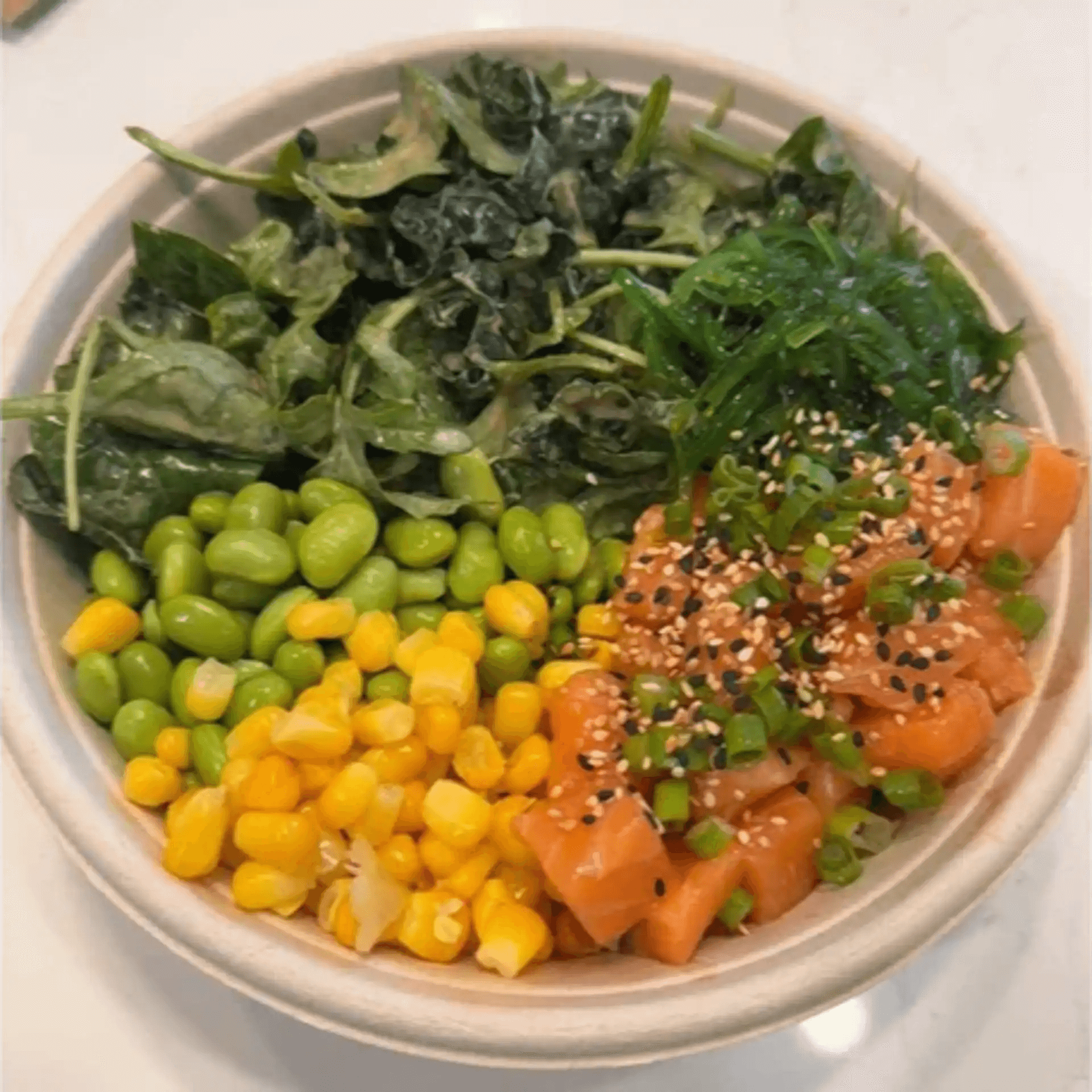 Salmon bowl with edamame, corn, seaweed salad and greens at F-F IN BOWL, a Asian Fusion Restaurant in Santa Rosa