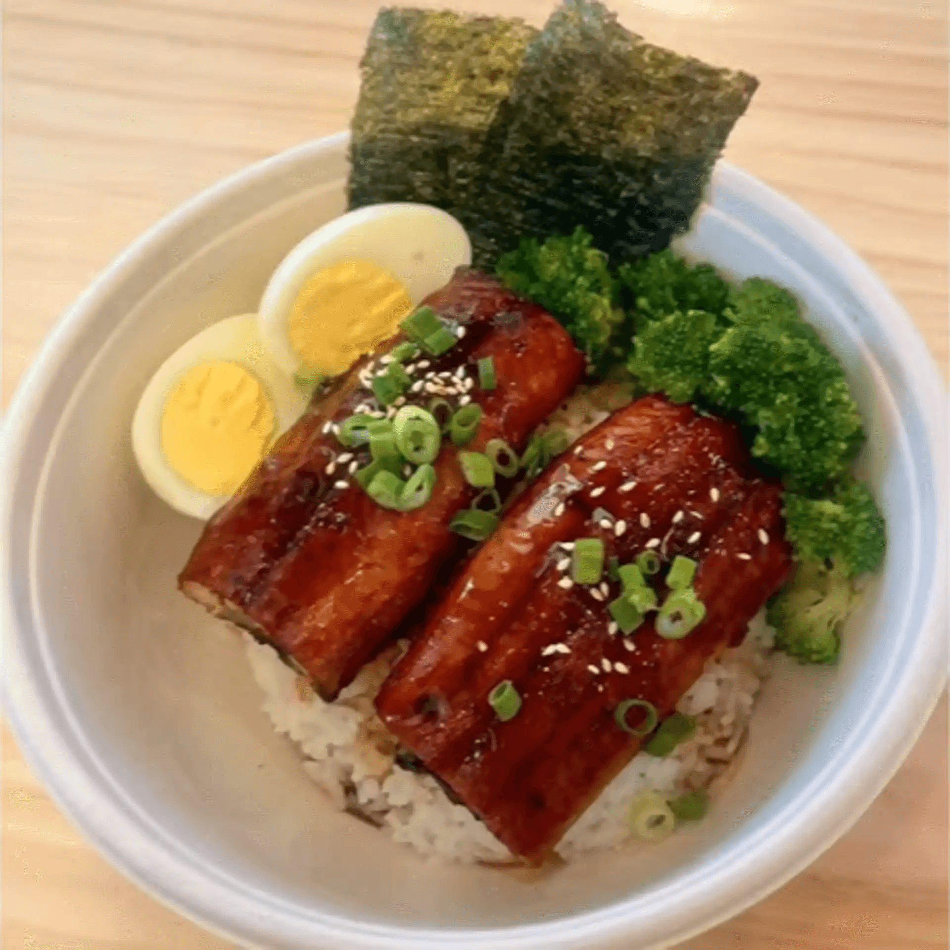 Unagi rice bowl with egg, broccoli and nori at F-F IN BOWL, a Asian Fusion Restaurant in Santa Rosa