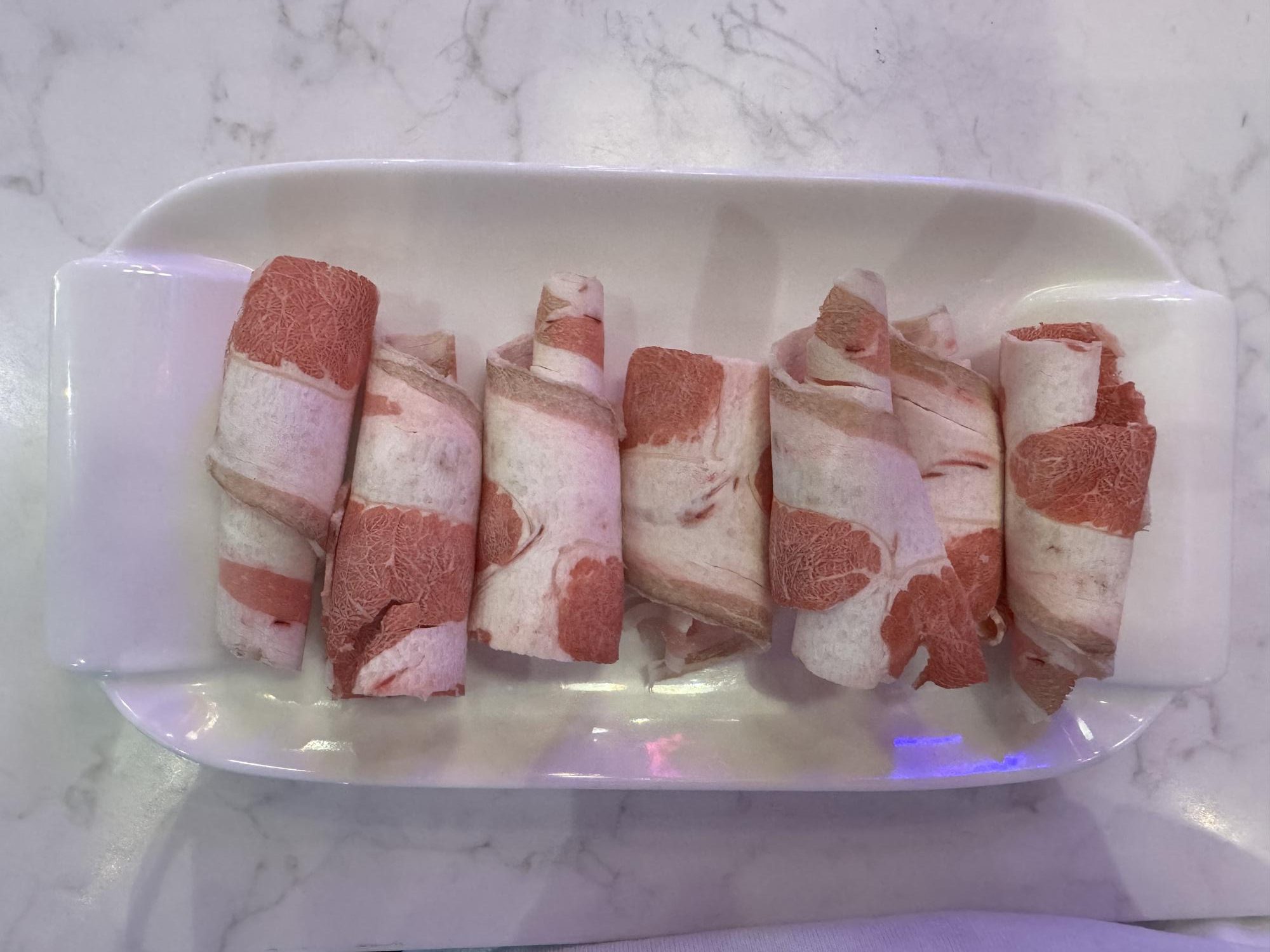 Fire-Pot-Korean-Barbecue-&-Hot-Pot-Restaurant-Beef-belly-Fort-Worth Fresh beef belly slices for grilling or hot pot at Fire Pot,a Korean Barbecue & Hot Pot Restaurant in Fort Worth.