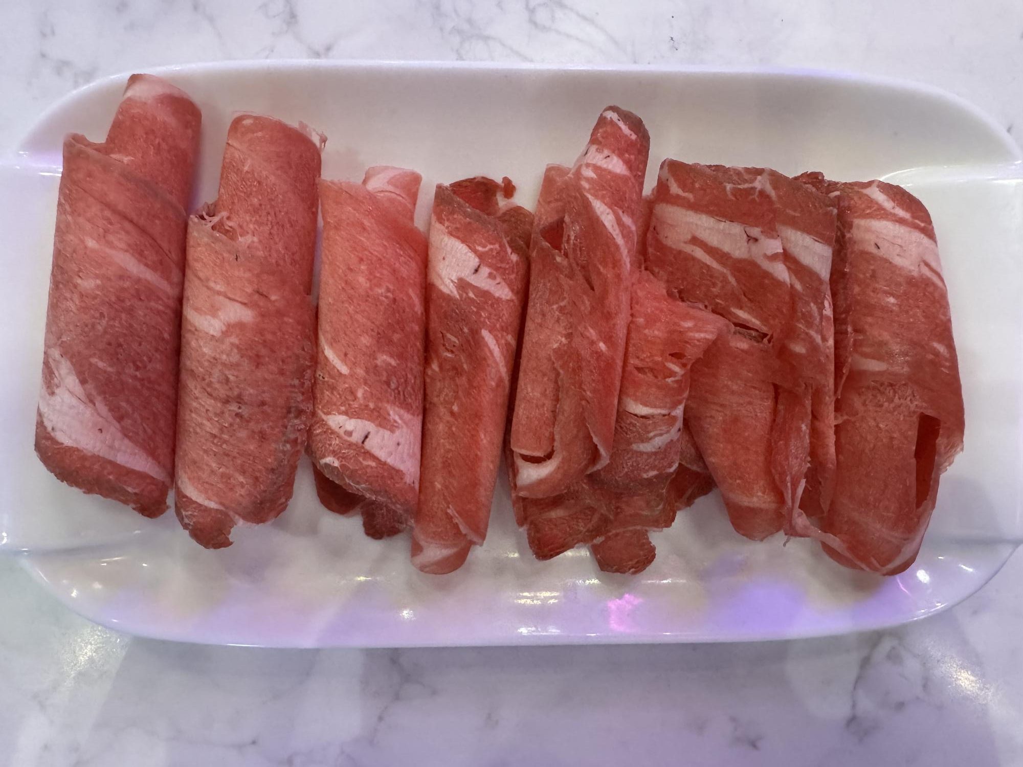 Fire-Pot-Korean-Barbecue-&-Hot-Pot-Restaurant-Beef-ribeye-Fort-Worth High - quality beef ribeye slices for grilling or hot pot at Fire Pot,a Korean Barbecue & Hot Pot Restaurant in Fort Worth.