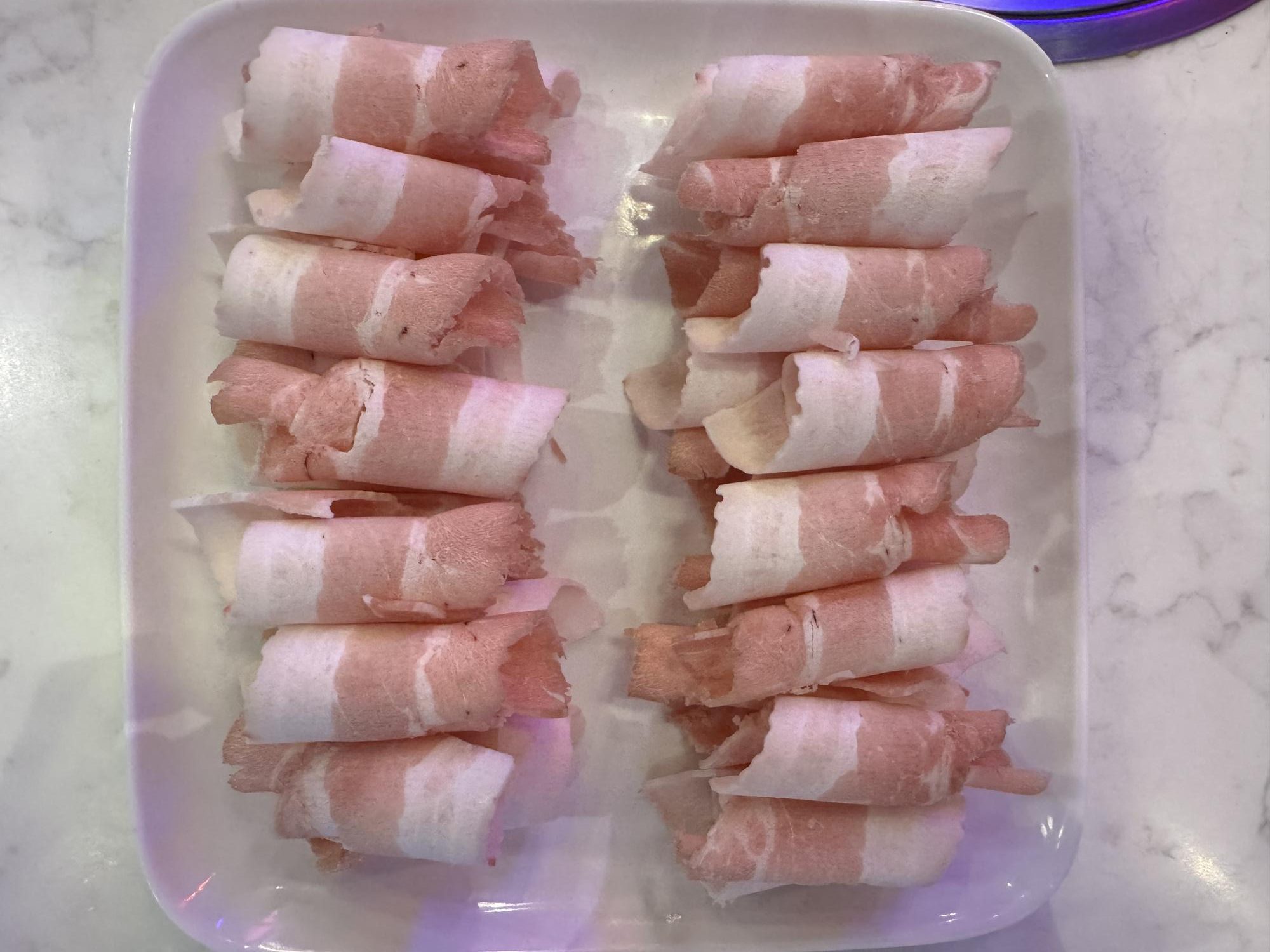 Fire-Pot-Korean-Barbecue-&-Hot-Pot-Restaurant-Pork-belly-Fort-Worth Succulent pork belly slices for grilling or hot pot at Fire Pot,a Korean Barbecue & Hot Pot Restaurant in Fort Worth.