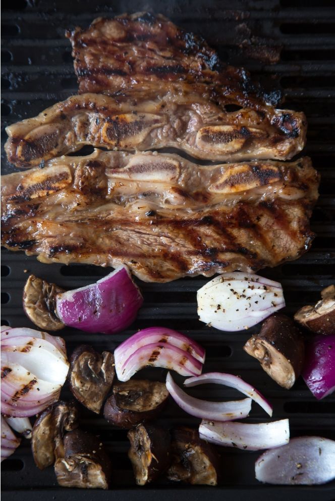 Korean BBQ and bibimbap platter with assorted meats and vegetables at Fire Pot Korean BBQ & Hot Pot, a Asian Restaurant in Grand Forks