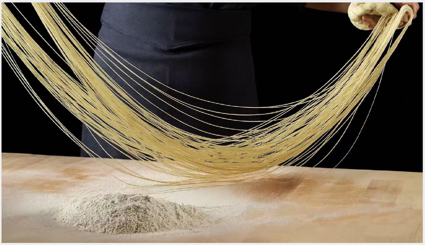 Chef stretches dough into thin noodles at First Meeting Noodle, a Chinese Restaurant in Rochester