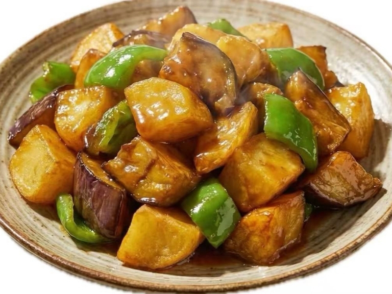 Colorful diced eggplant, potato, and green pepper stir-fry at Foodieholic Chinese Noodle & Kitchen, a Chinese restaurant in Durham