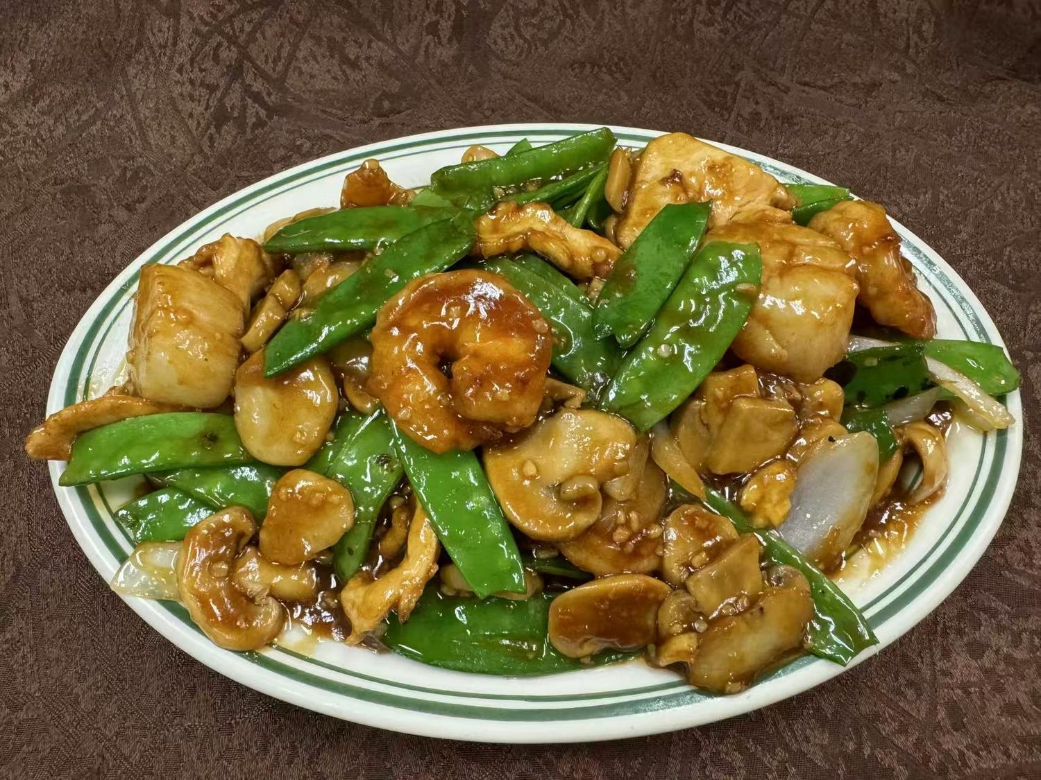 Mixed seafood and chicken with snow peas and mushrooms at Forbidden City Chinese Restaurant in Westminster