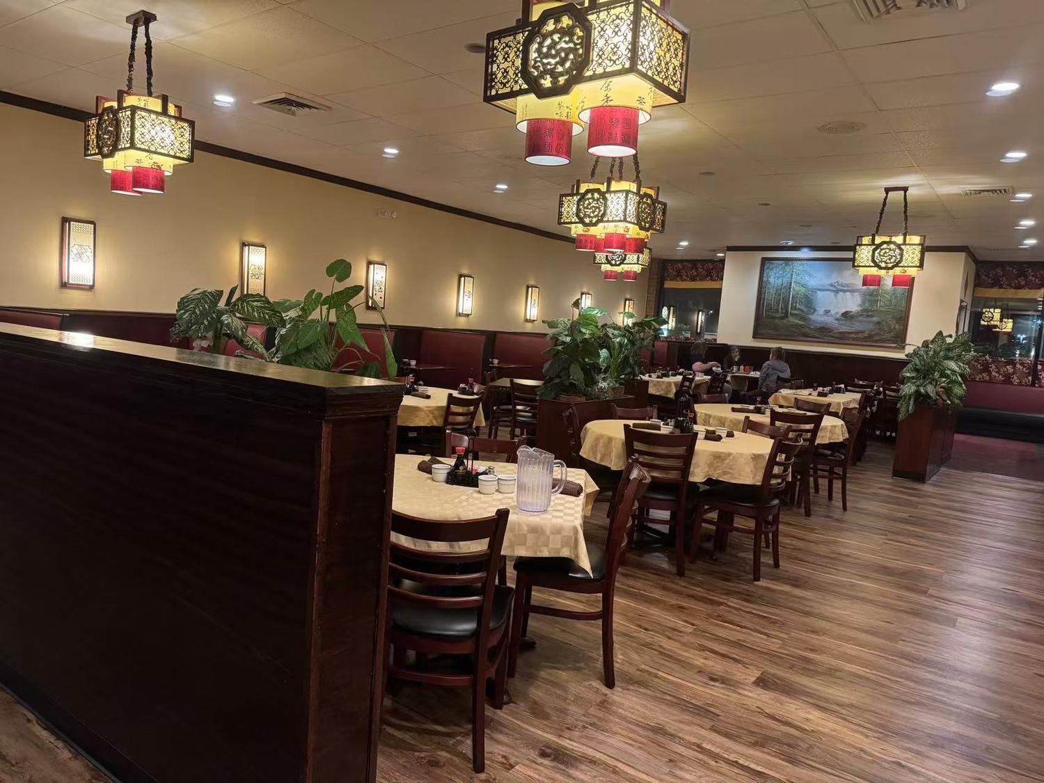 Elegant dining room with traditional Chinese lanterns and greenery at Forbidden City Chinese Restaurant in Westminster