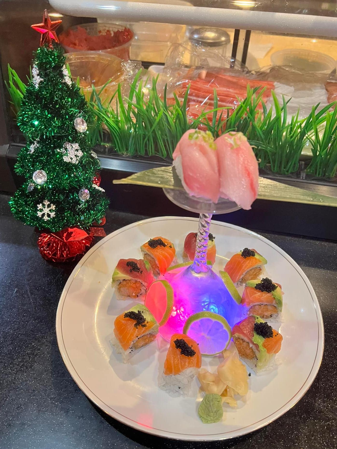 Fuji-Hibachi-&-Sushi-Steakhouse-Japanese-Restaurant-Christmas-Sushi-Platter-Edgewater Christmas Sushi Platter - Sushi rolls with festive decor, including a mini Christmas tree at Fuji Hibachi & Sushi Steakhouse, a Japanese restaurant in Edgewater