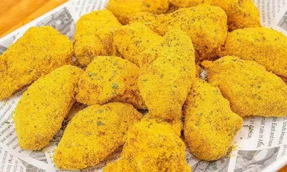 Crispy chicken wings coated in cheese powder at Fuji Ramen Japanese Cuisine, a Japanese Restaurant in New Philadelphia