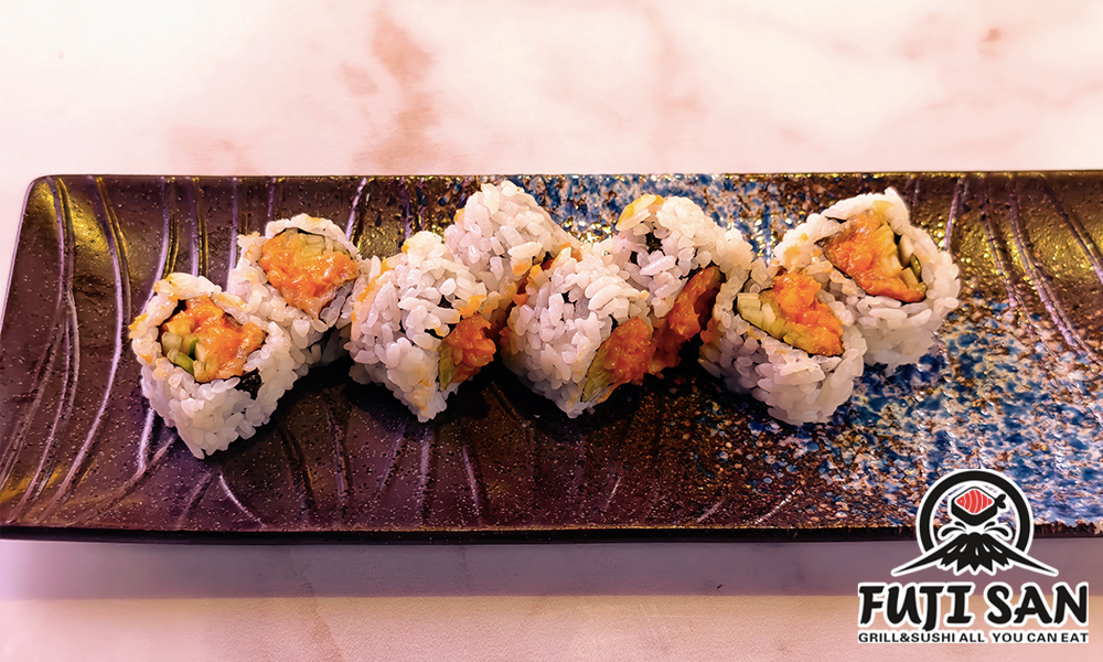 Spicy yellowtail sushi roll with sauce at Watami, a Japanized Western Restaurant in Chandler