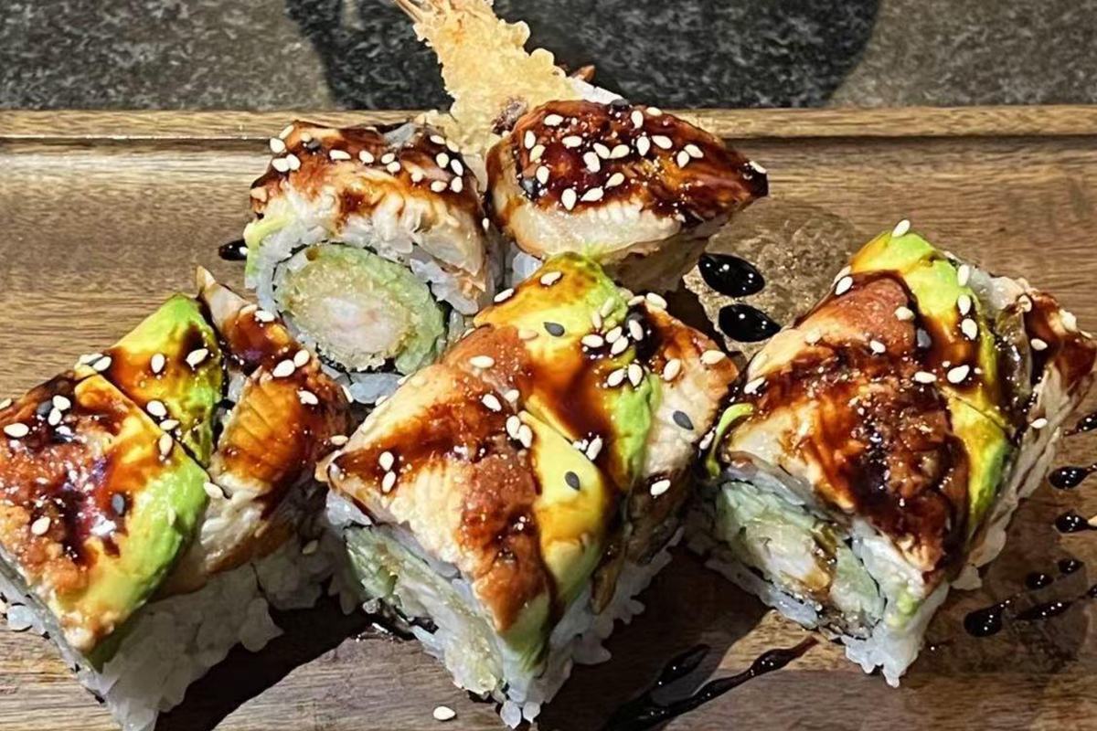 New York Roll sushi with sauce at Fusion Cuisine，a Asian Fusion Restaurant in Madison