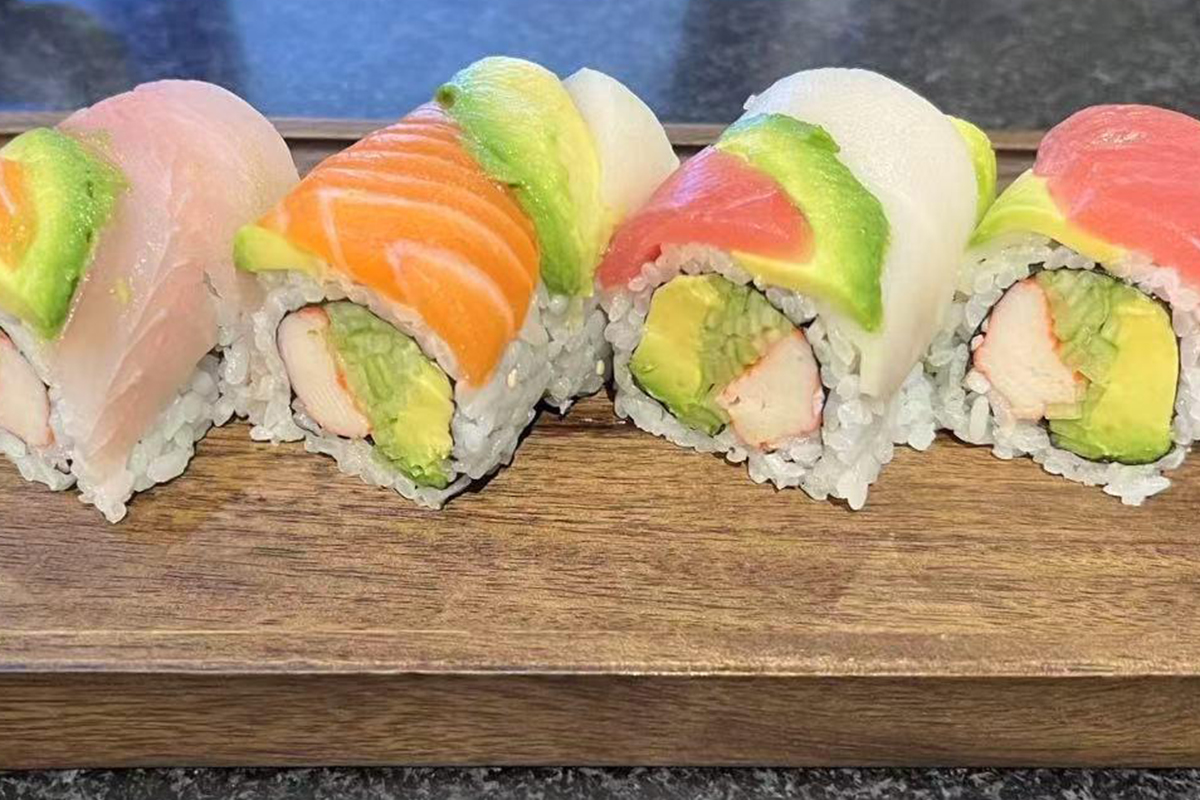 Colorful Rainbow Roll sushi at Fusion Cuisine，a Asian Fusion Restaurant in Madison