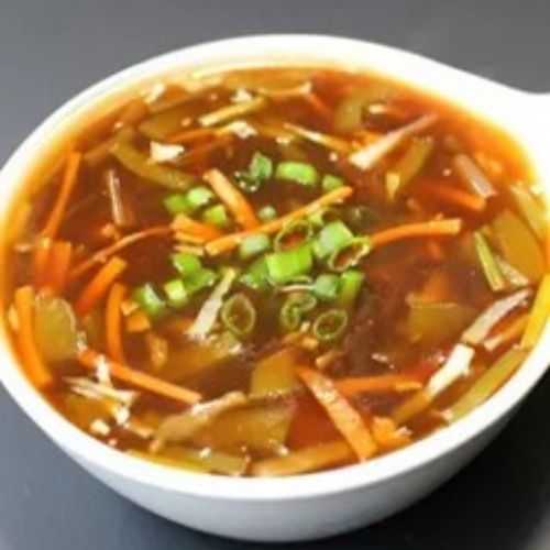 Hot and sour soup topped with chopped green onions at Fusion Express chinatown, Chinese Restaurant in East Hampton
