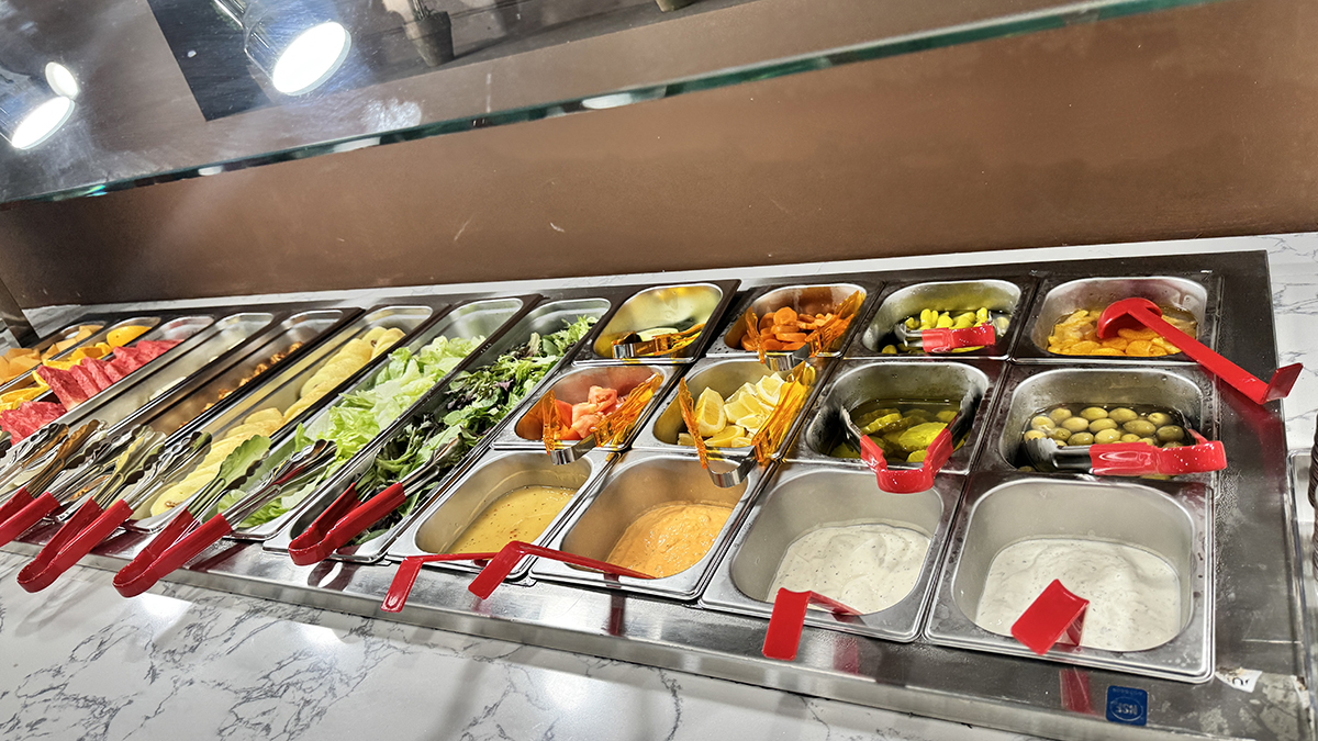 Mongolian & Sushi-Asian-Fusion-Restaurant-Self-service-salad-Carteret Self - service salad bar with lettuce, lemon slices, various sauces at Mongolian & Sushi,a Asian Fusion Restaurant in Carteret