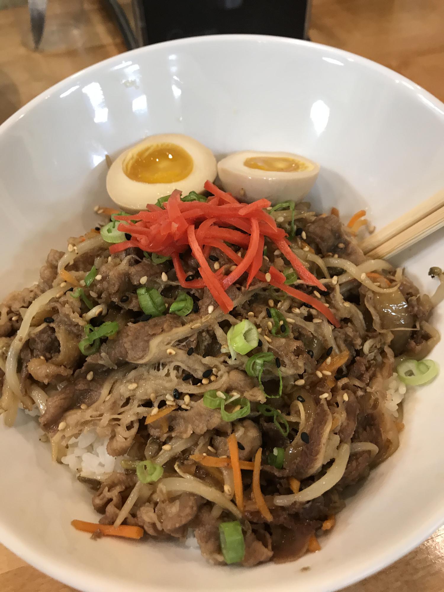 Beef gyudon rice bowl with marinated egg and pickled ginger at Fusion Poke, an Asian Fusion Restaurant in Milwaukee