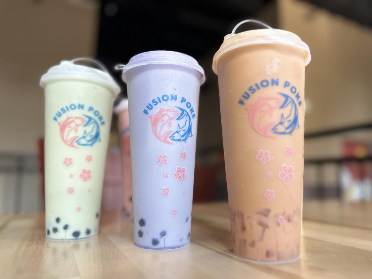Colorful bubble tea drinks with various toppings at Fusion Poke, an Asian Fusion Restaurant in Milwaukee