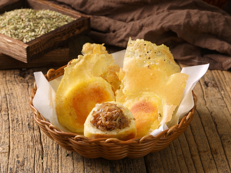 Crispy fried stuffed buns with savory shredded meat filling at Gao Qunsheng's Spicy Soup, a Chinese Restaurant in Flushing
