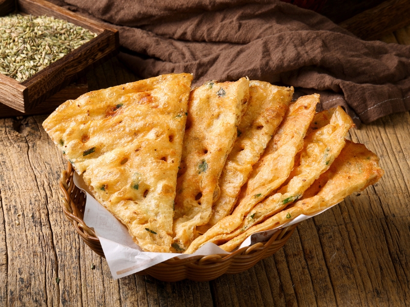Crispy scallion pancake with fresh chopped green onions at Gao Qunsheng's Spicy Soup, a Chinese Restaurant in Flushing