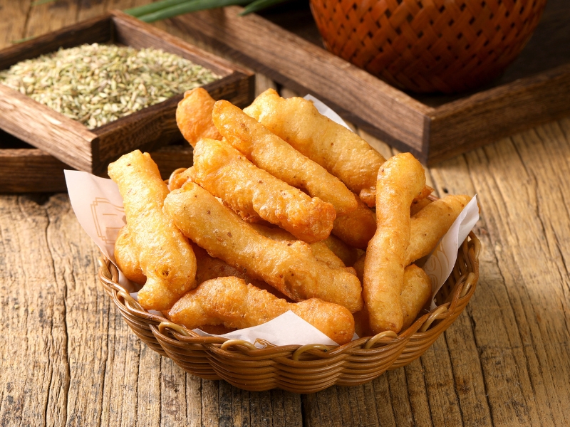 Golden crispy fried dough sticks with fennel seasoning at Gao Qunsheng's Spicy Soup, a Chinese Restaurant in Flushing