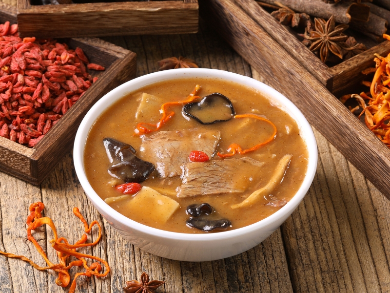 Nutritious herbal beef soup with goji berries, fungus and cordyceps at Gao Qunsheng's Spicy Soup, a Chinese Restaurant in Flushing