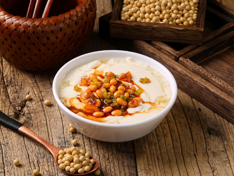 Smooth tofu pudding topped with spicy soybeans and scallions at Gao Qunsheng's Spicy Soup, a Chinese Restaurant in Flushing