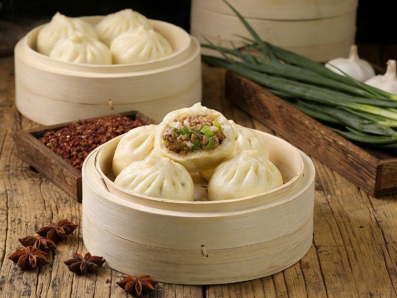 Soft steamed buns stuffed with minced meat and scallions at Gao Qunsheng's Spicy Soup, a Chinese Restaurant in Flushing