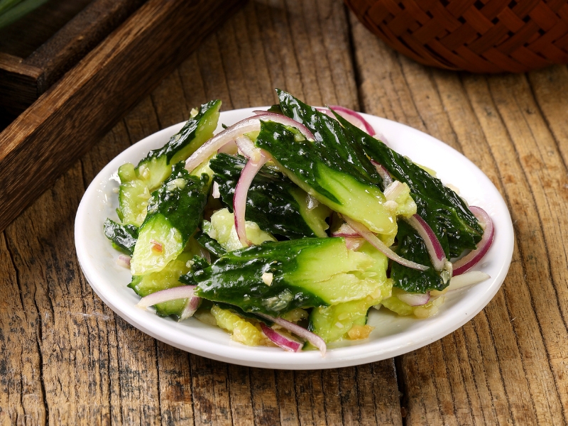 Spicy smashed cucumber salad with onion at Gao Qunsheng's Spicy Soup, a Chinese Restaurant in Flushing