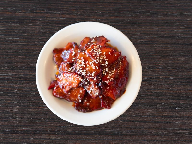 Sweet and savory BBQ pork with sesame seeds at Ginger Zing, a Chinese Restaurant in Mesa