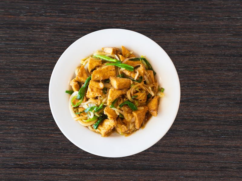 Savory tofu stir-fried with scallions and bean sprouts at Ginger Zing, a Chinese Restaurant in Mesa