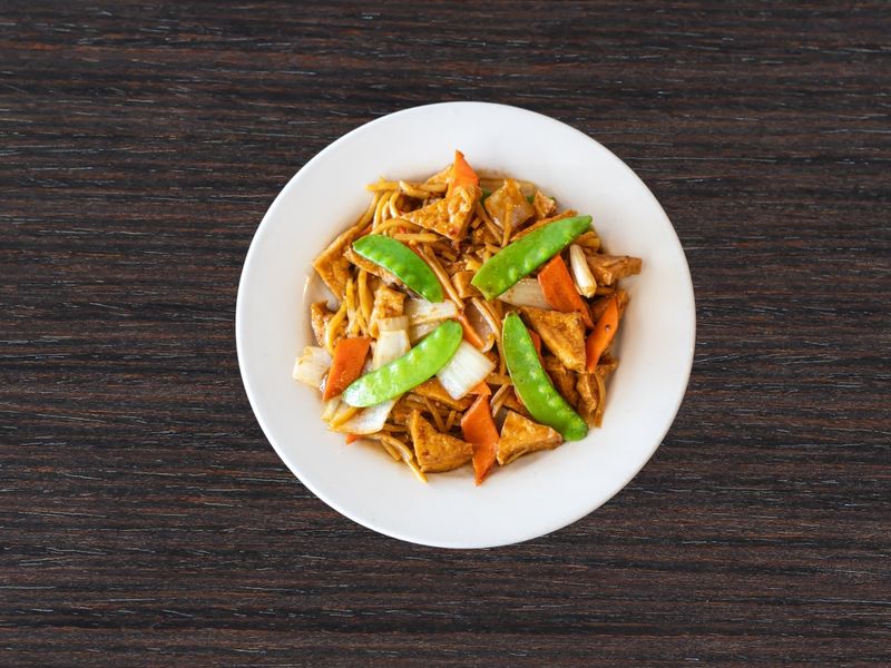 Silky lo mein with tofu, snow peas and veggies at Ginger Zing, a Chinese Restaurant in Mesa