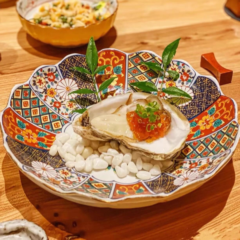 Fresh oyster topped with roe, flavorful at Ginza Sushi and Ramen, a Japanese Restaurant in Salem