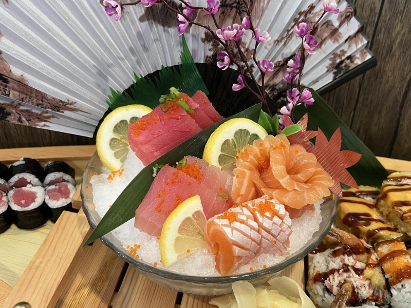 Sashimi and sushi platter with decorative touches at Ginza Sushi and Ramen, a Japanese Restaurant in Salem