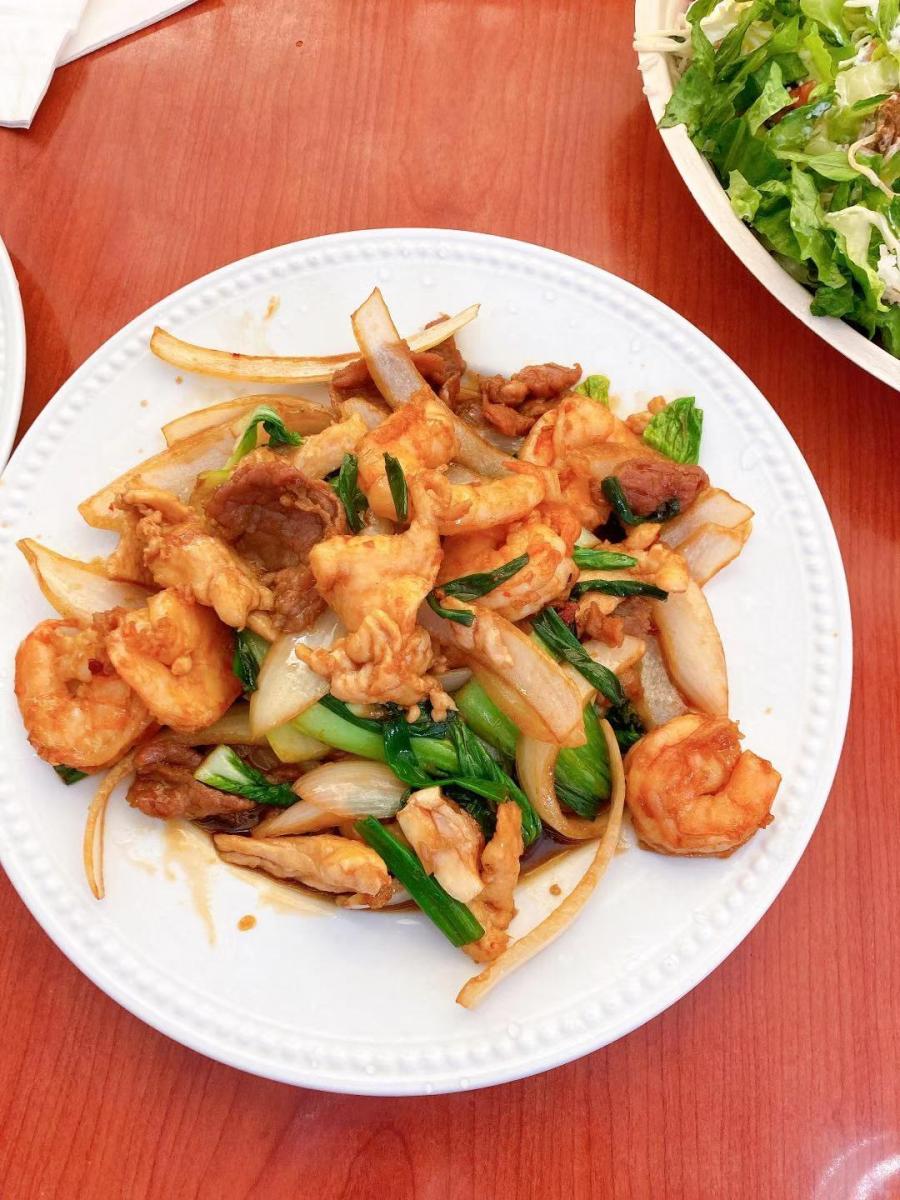 Shrimp and chicken stir-fry with onions and greens at Golden China Restaurant in Front Royal