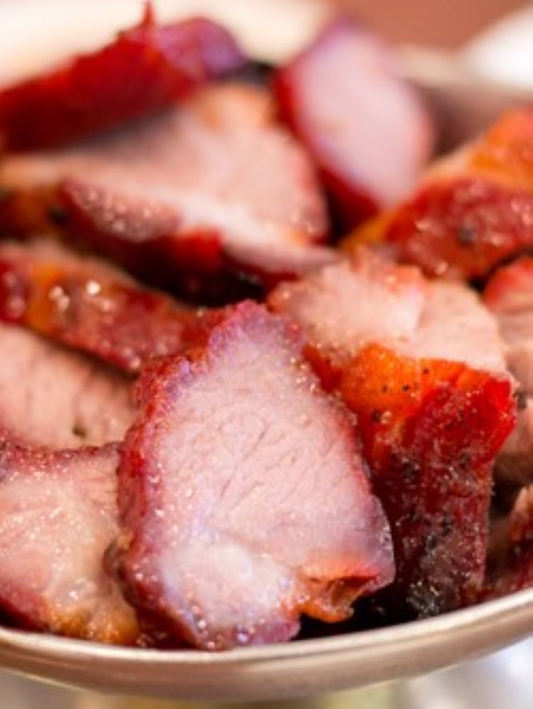 Sliced tender roasted char siu pork served in ceramic bowl at Golden Dragon Restaurant, a Chinese Restaurant in East Troy Sliced tender roasted char siu pork served in ceramic bowl at Golden Dragon Restaurant, a Chinese Restaurant in East Troy
