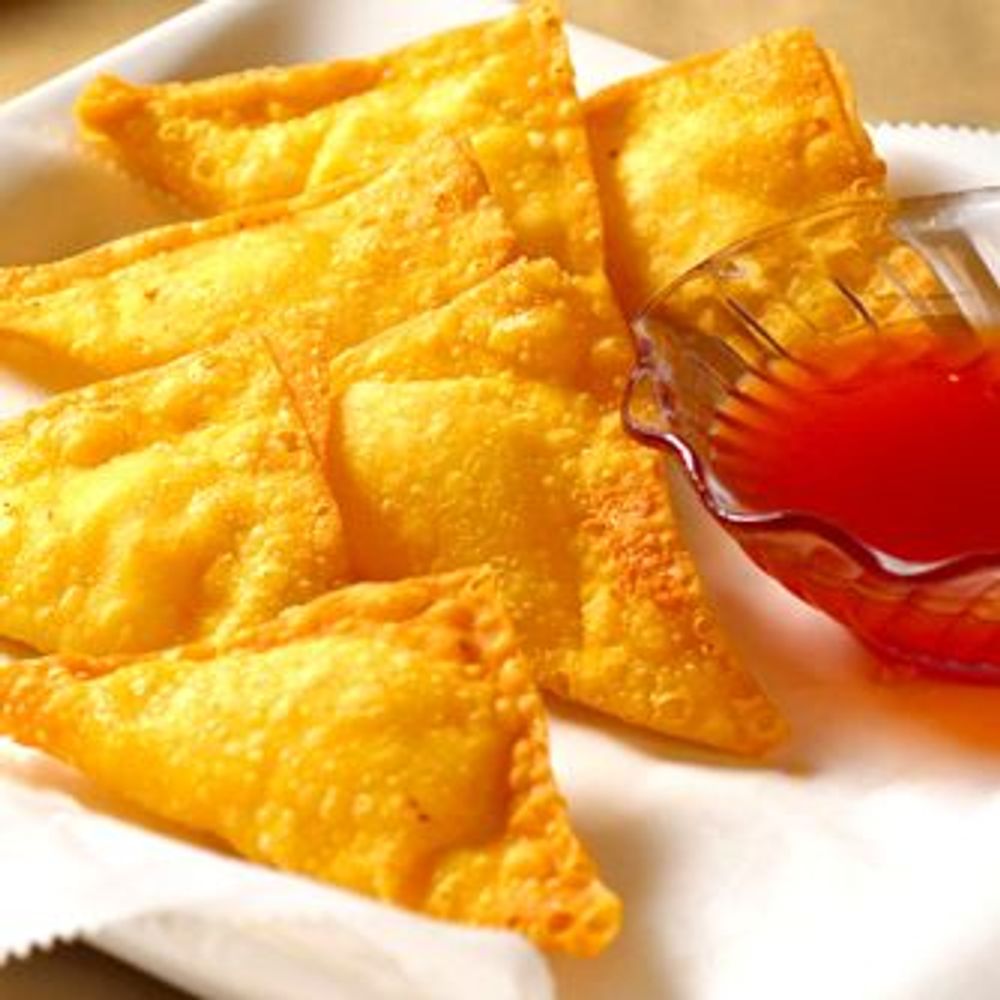Crispy fried cheese wontons served with sweet red dipping sauce at Golden Dragon Restaurant, a Chinese Restaurant in East Troy