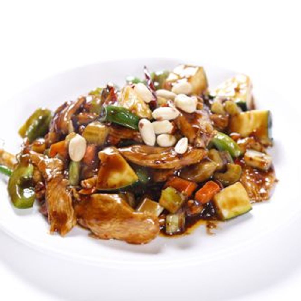Kung pao chicken stir‑fried with peanuts and mixed veggies at Golden Dragon Restaurant, a Chinese Restaurant in East Troy