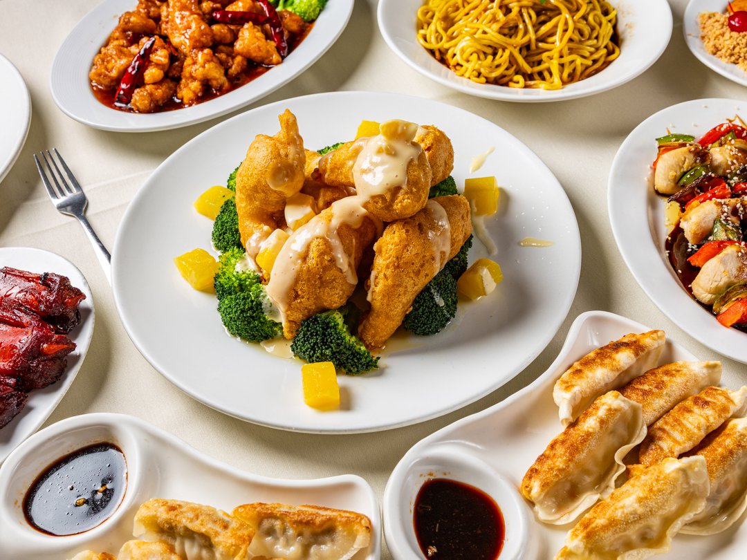 Assorted Chinese cuisine dishes with fried entrees and pan-fried dumplings at Golden Mushroom, an Asian Fusion Restaurant in Nyack