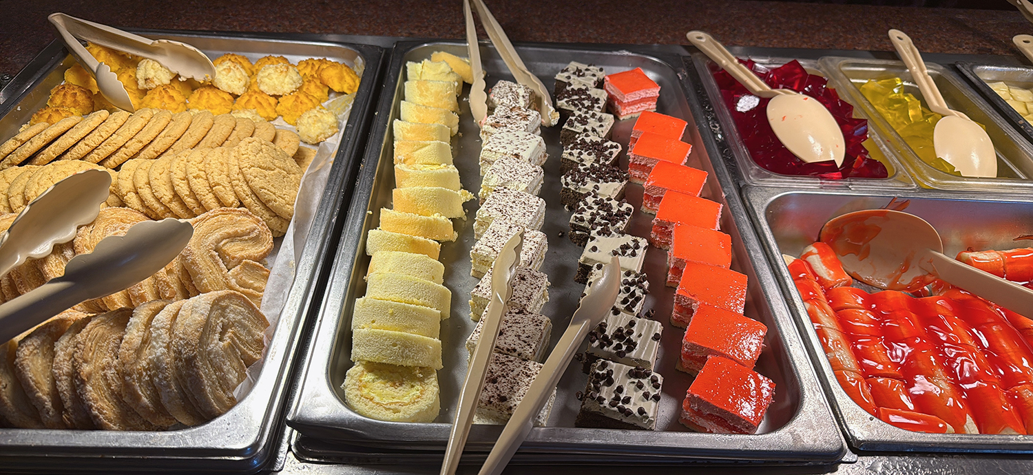 Tray of various cookies, pastries and jellies with serving utensils at Golden Wok，a Chinese Restaurant in Weaverville
