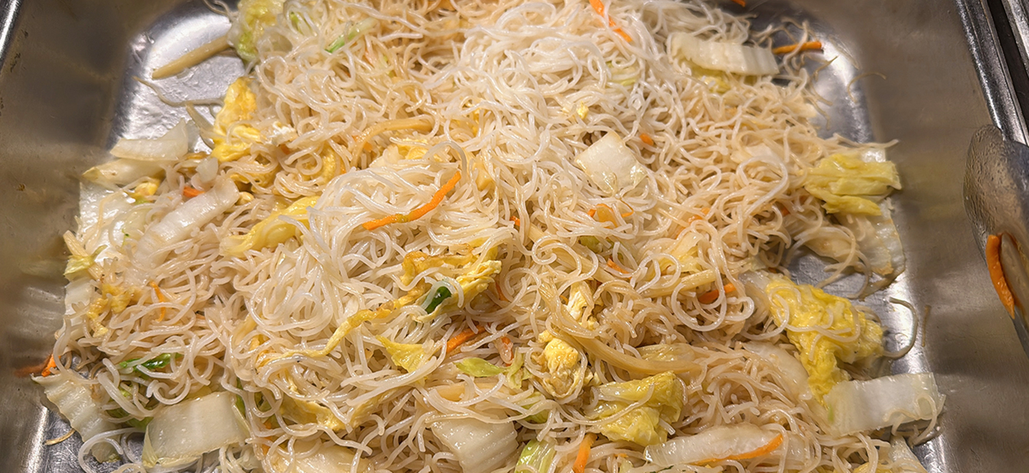 Pan of stir - fried rice noodles with vegetables at Golden Wok，a Chinese Restaurant in Weaverville